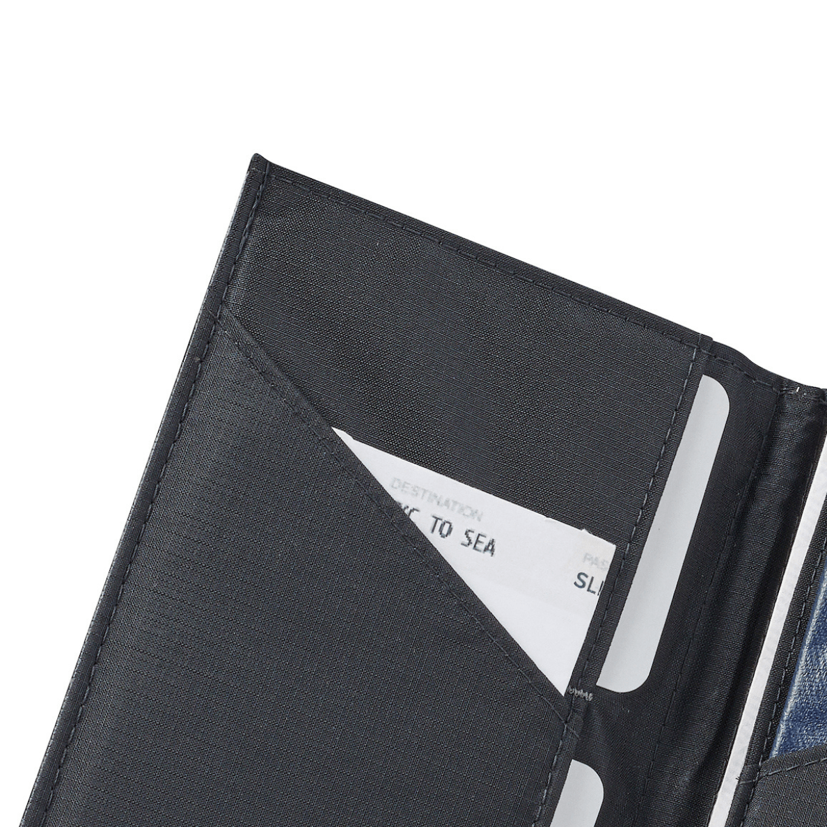 Close up of the Slim Leather Travel Wallet by Allett for passport - onyx-black