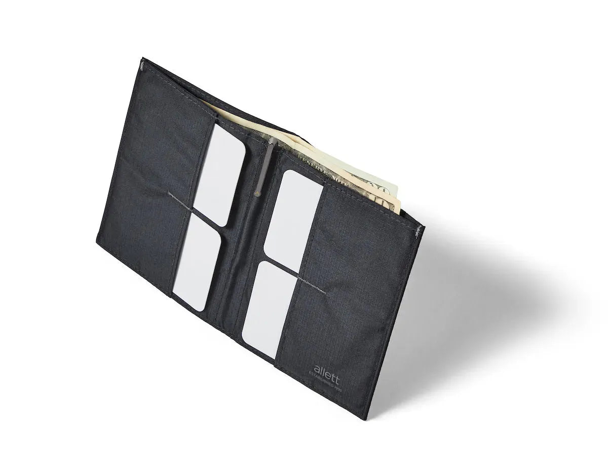 Profile of the Allett Wallets The Original vegan nylon wallet in with RFID blocking technology, showcasing the number of cards it holds jet-black