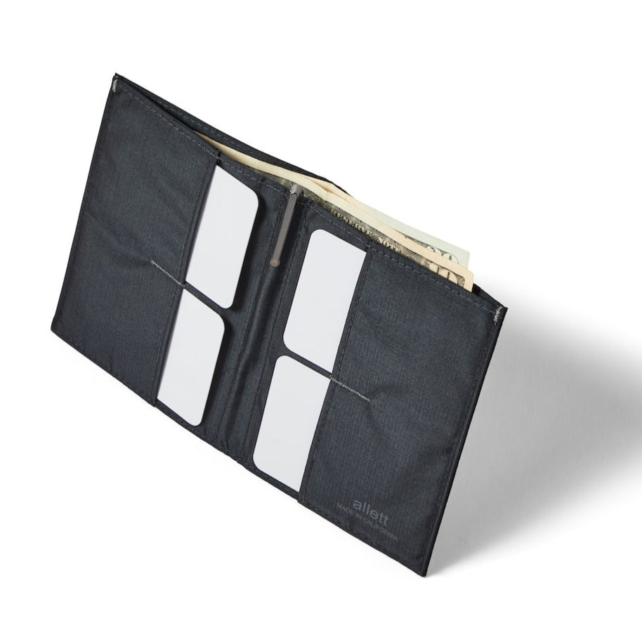 Profile of the Allett Wallets The Original vegan nylon wallet in with RFID blocking technology, showcasing the number of cards it holds jet-black