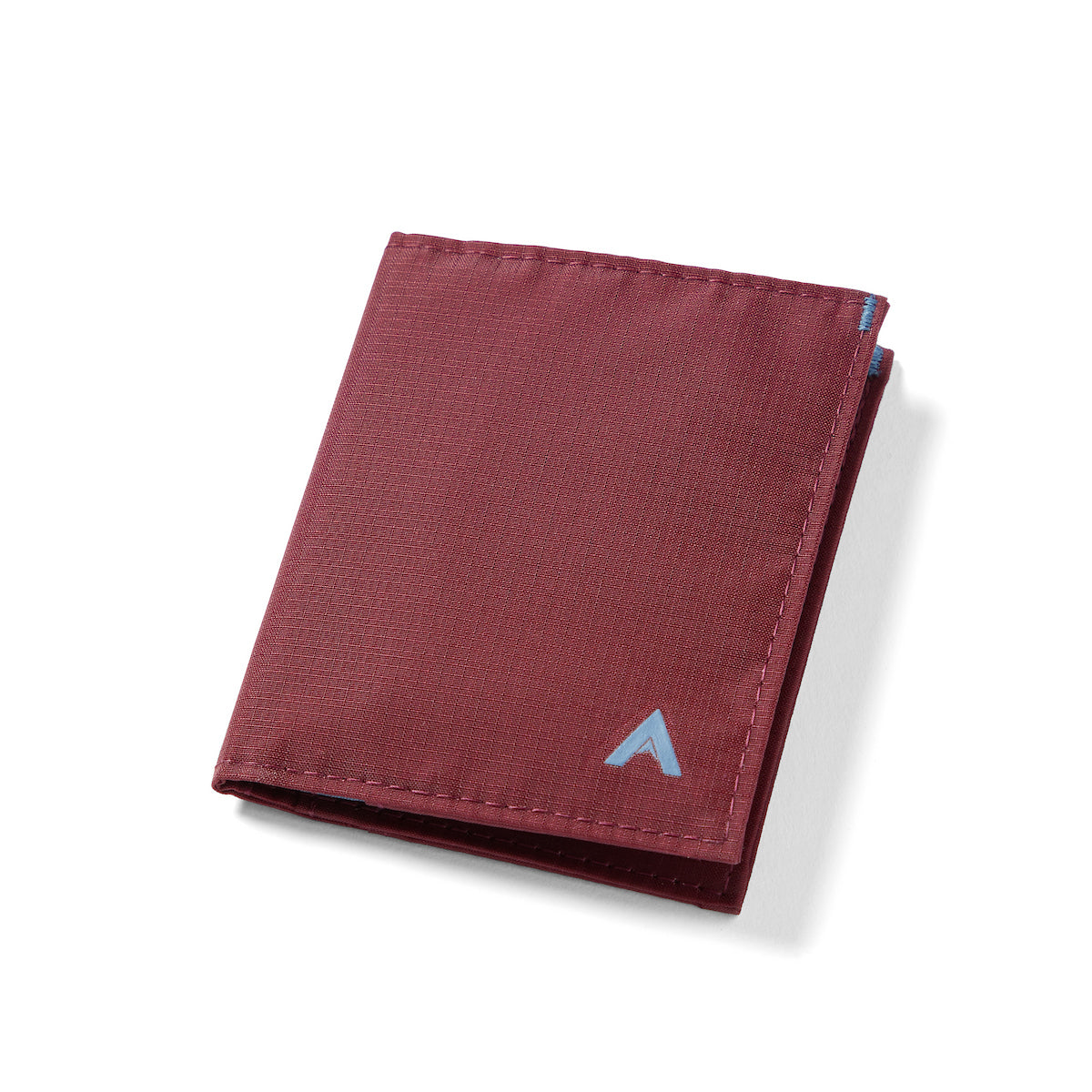 Allett's ultra-thin Mulberry hybrid card wallet, made from ripstop nylon, presented closed against a white setting. Allett Hybrid Card Wallet mulberry