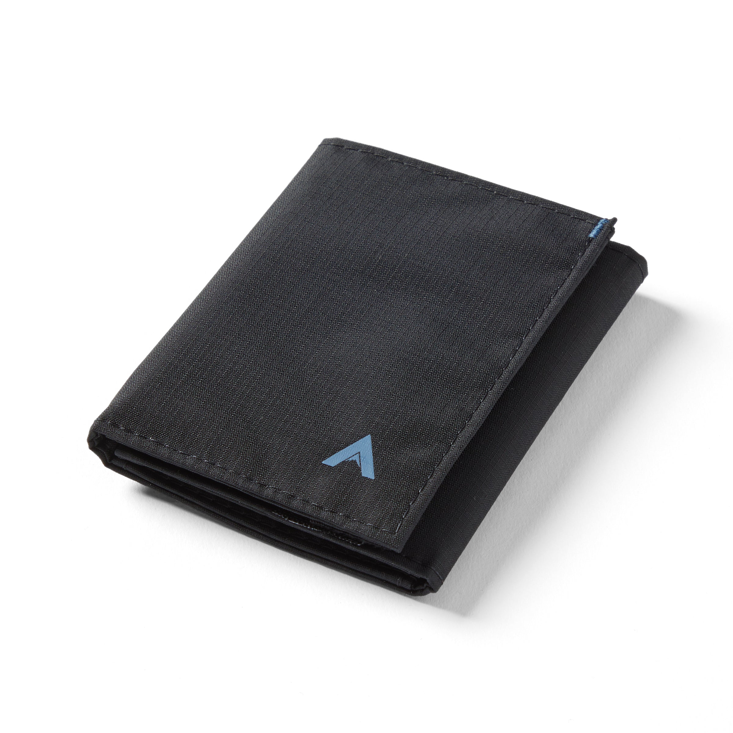 Jet black vegan nylon trifold wallet sitting closed against a white background. Allett Trifold Wallet nylon edition - jet-black